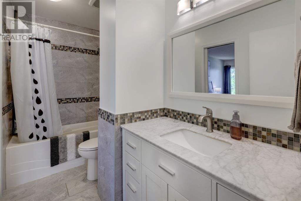 Single Family House 4 Level for Sale in  MacEwan Meadow Rise NW MacEwan Glen Calgary 