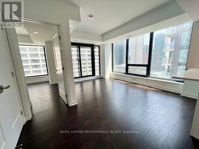 View of LR/DR, door to bedroom