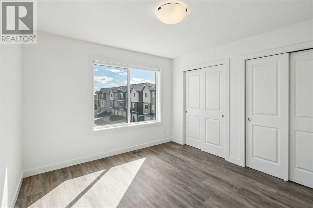 Photo 8 of 204 24 Rivercrest Drive, Cochrane AB