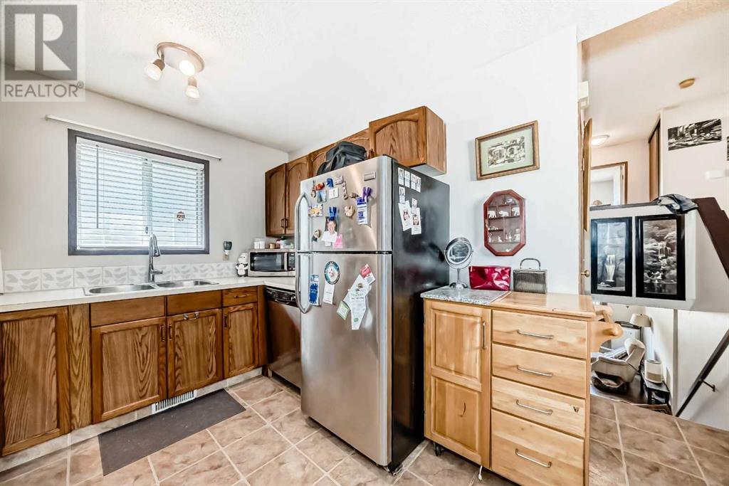 Single Family House 4 Level for Sale in  Martinview Crescent NE Martindale Calgary 