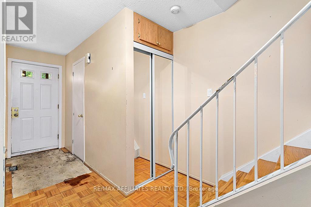 Large foyer w  garage entry + hardwood stairs