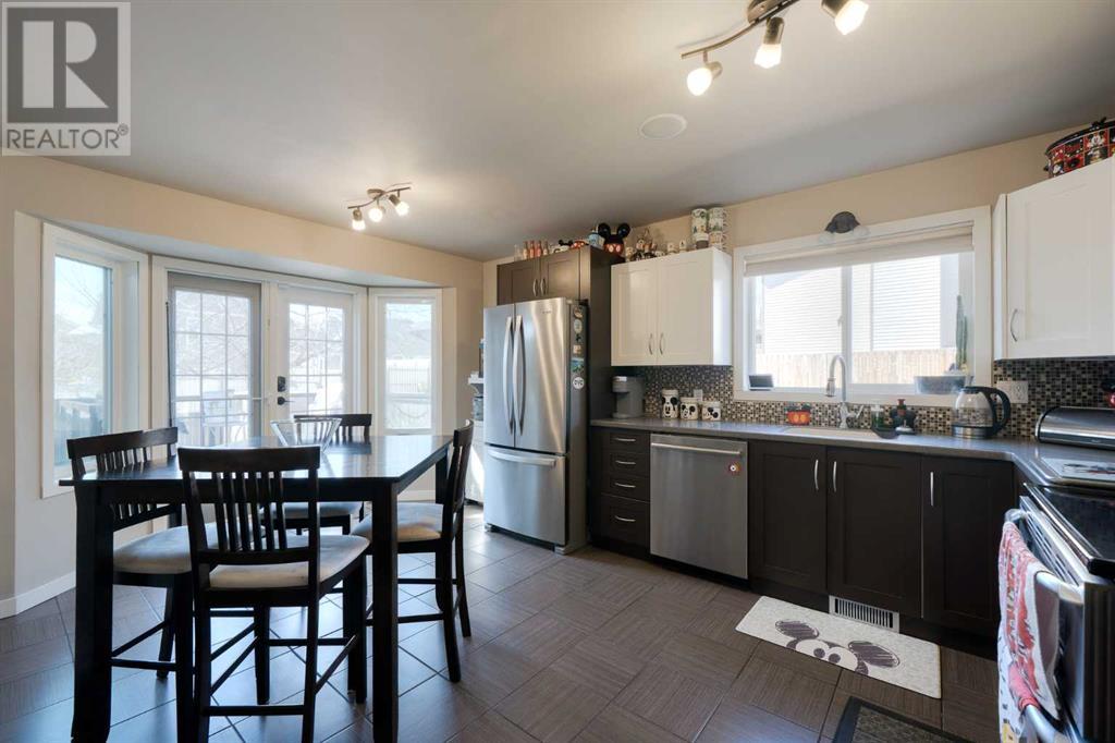 Single Family House 4 Level for Sale in  MacEwan Meadow Way NW MacEwan Glen Calgary 