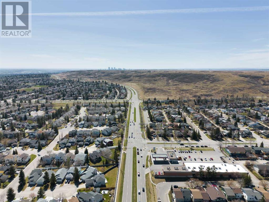 Single Family House 4 Level for Sale in  MacEwan Meadow Way NW MacEwan Glen Calgary 