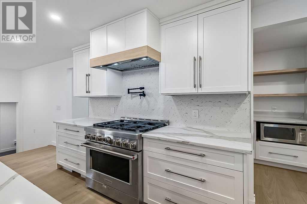 Single Family House Bungalow for Sale in  Lake Twintree Road SE Lake Bonavista Calgary 