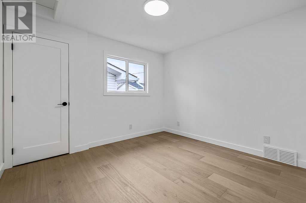Single Family House Bungalow for Sale in  Lake Twintree Road SE Lake Bonavista Calgary 