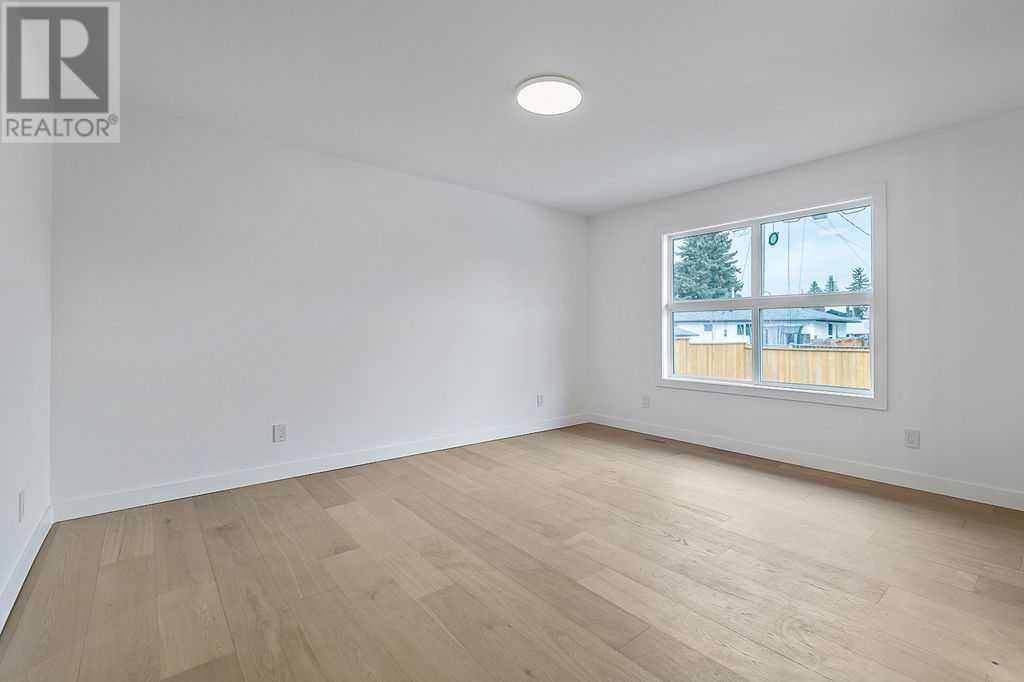 Single Family House Bungalow for Sale in  Lake Twintree Road SE Lake Bonavista Calgary 