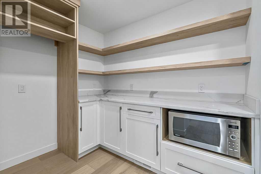 Single Family House Bungalow for Sale in  Lake Twintree Road SE Lake Bonavista Calgary 