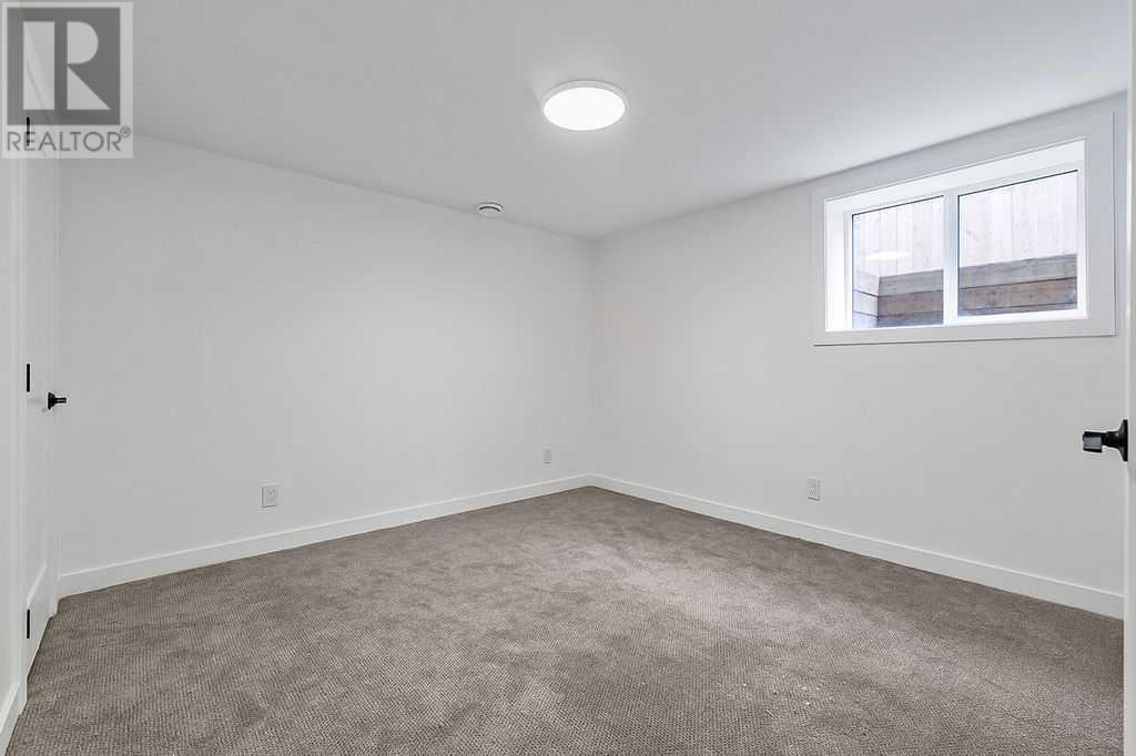 Single Family House Bungalow for Sale in  Lake Twintree Road SE Lake Bonavista Calgary 