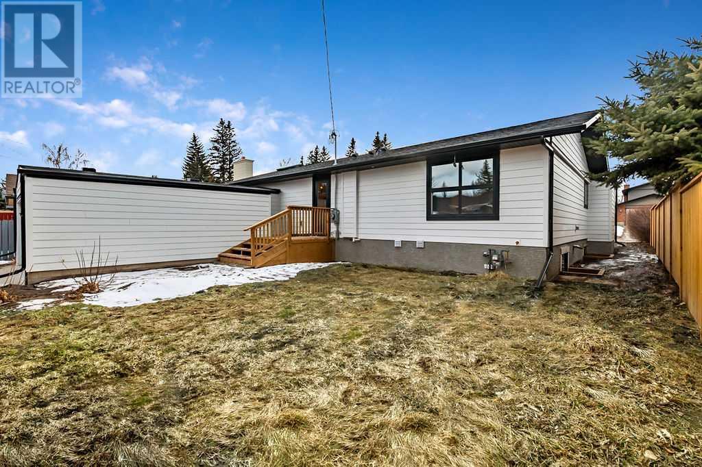 Single Family House Bungalow for Sale in  Lake Twintree Road SE Lake Bonavista Calgary 