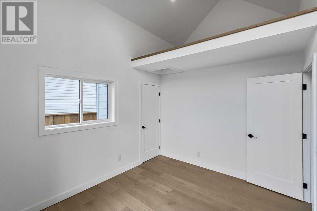 Single Family House Bungalow for Sale in  Lake Twintree Road SE Lake Bonavista Calgary 