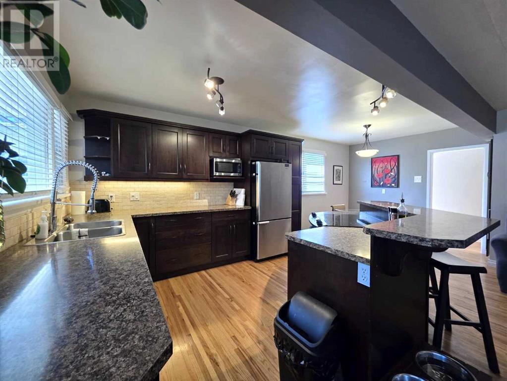 Single Family House Bungalow for Sale in   Street S Glendale Lethbridge 