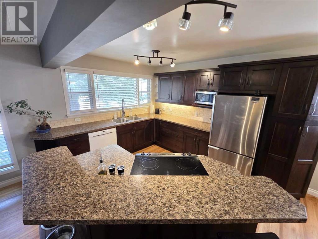 Single Family House Bungalow for Sale in   Street S Glendale Lethbridge 