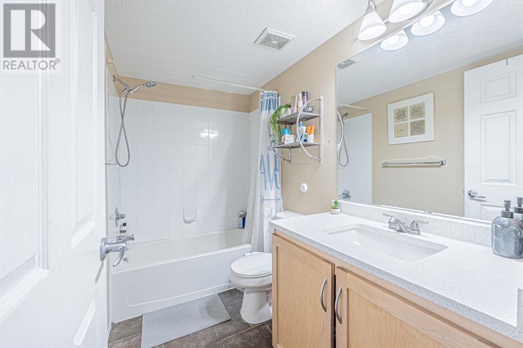 Photo 29 of 7105 304 Mackenzie Way Sw, Airdrie AB