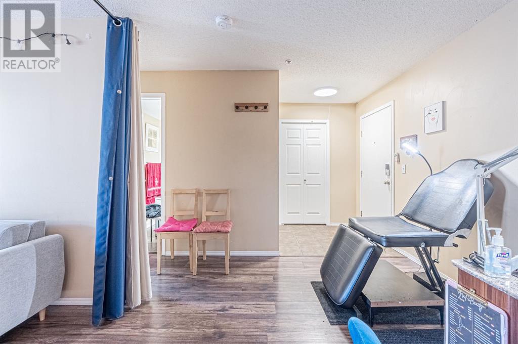 Photo 3 of 7105 304 Mackenzie Way Sw, Airdrie AB