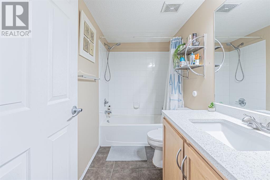 Photo 32 of 7105 304 Mackenzie Way Sw, Airdrie AB