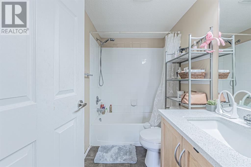 Photo 16 of 7105 304 Mackenzie Way Sw, Airdrie AB