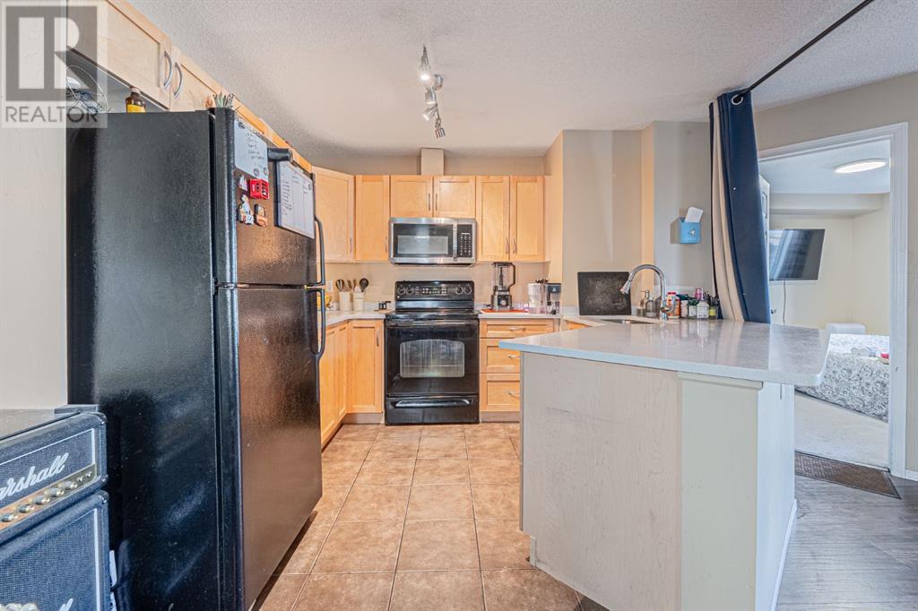 Photo 2 of 7105 304 Mackenzie Way Sw, Airdrie AB
