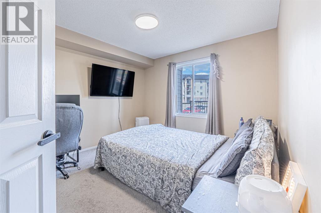 Photo 12 of 7105 304 Mackenzie Way Sw, Airdrie AB