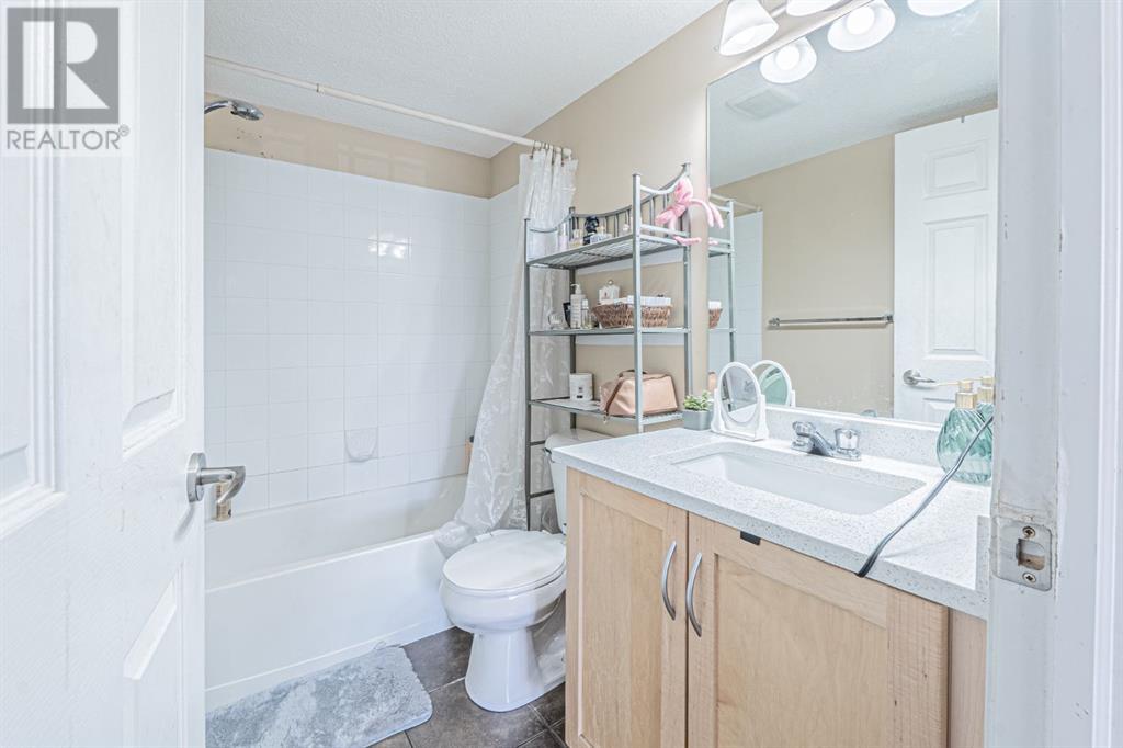 Photo 24 of 7105 304 Mackenzie Way Sw, Airdrie AB