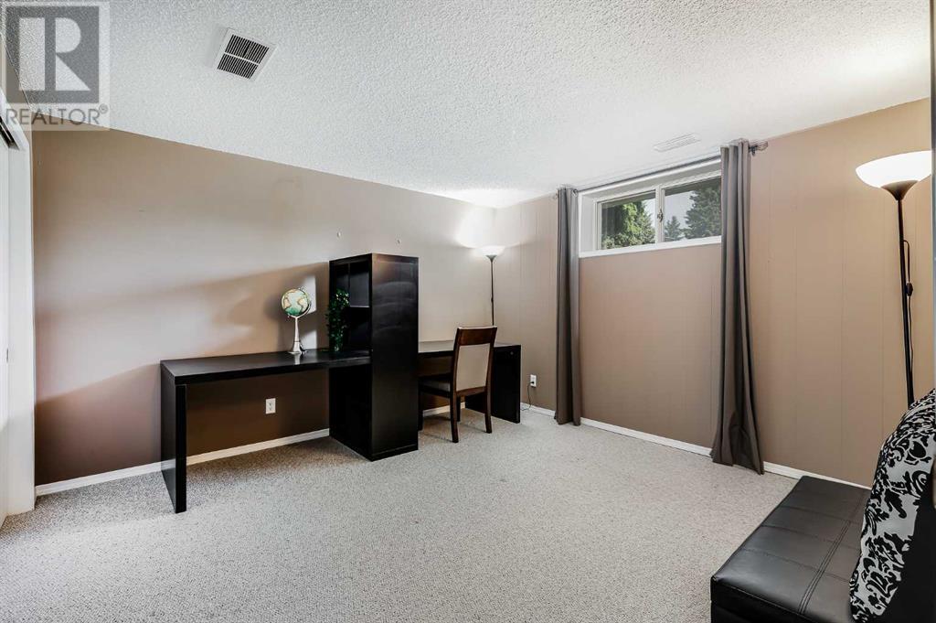 Single Family House Bi-level for Sale in   Avenue SW Braeside Calgary 