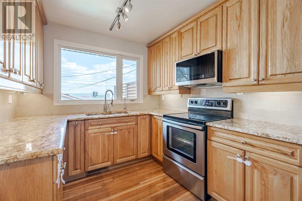 Single Family House Bi-level for Sale in  Addison Drive SE Acadia Calgary 