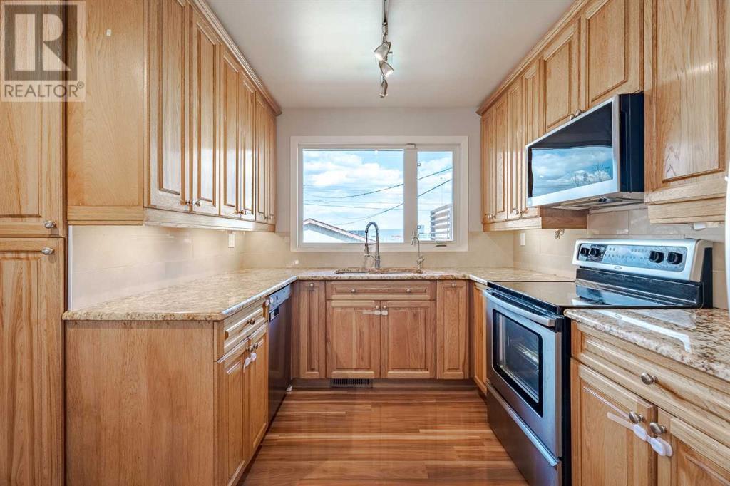 Single Family House Bi-level for Sale in  Addison Drive SE Acadia Calgary 