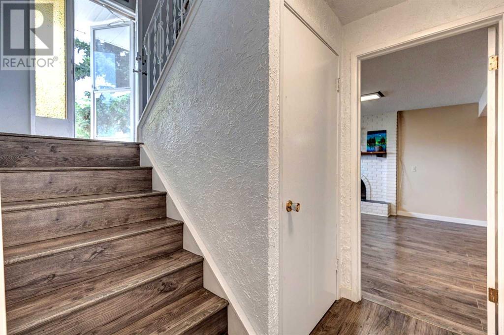 Single Family House Bi-level for Sale in  Braeside Drive SW Braeside Calgary 