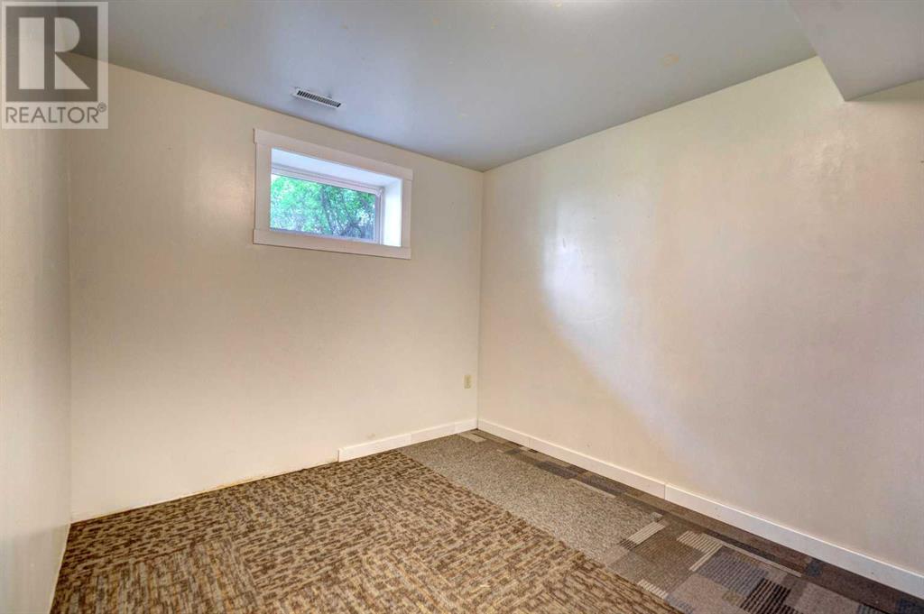 Single Family House Bi-level for Sale in  Braeside Drive SW Braeside Calgary 