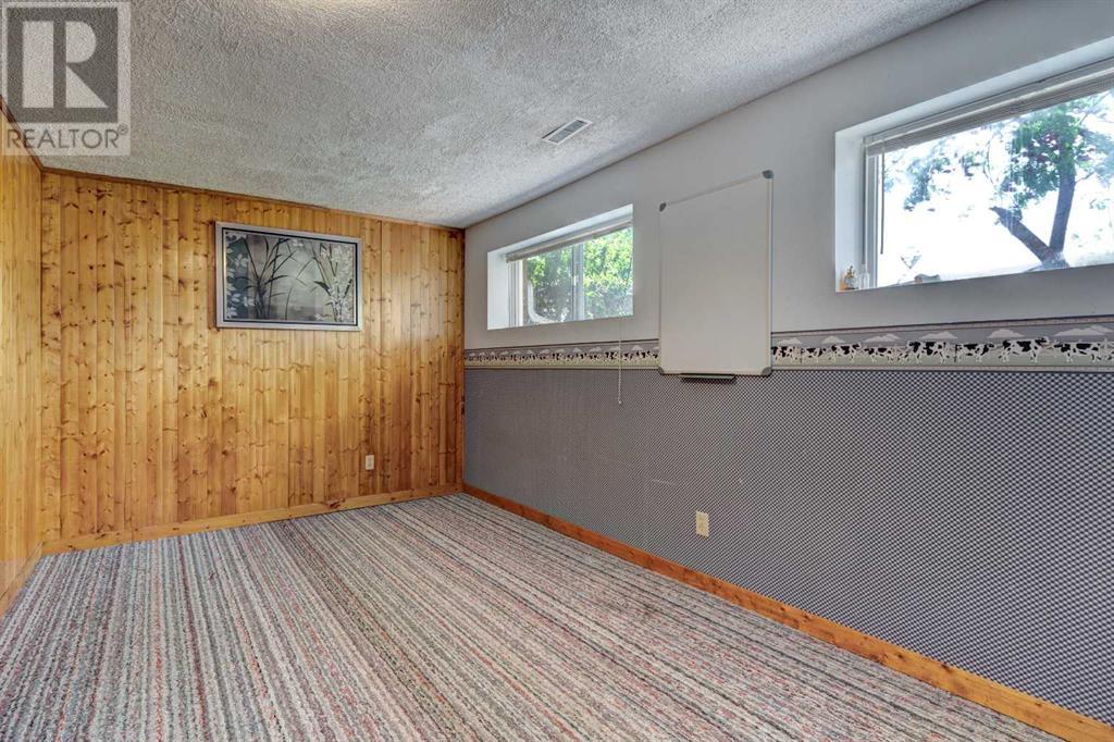 Single Family House Bi-level for Sale in  Braeside Drive SW Braeside Calgary 