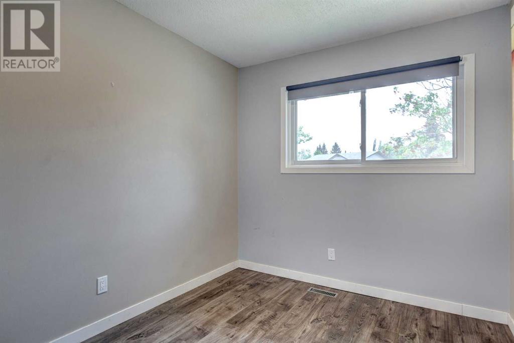 Single Family House Bi-level for Sale in  Braeside Drive SW Braeside Calgary 