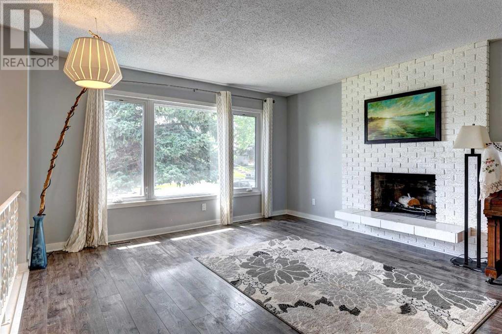 Single Family House Bi-level for Sale in  Braeside Drive SW Braeside Calgary 