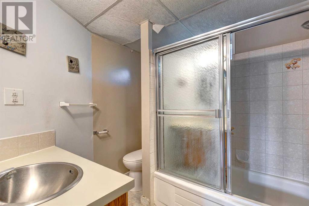 Single Family House Bi-level for Sale in  Braeside Drive SW Braeside Calgary 