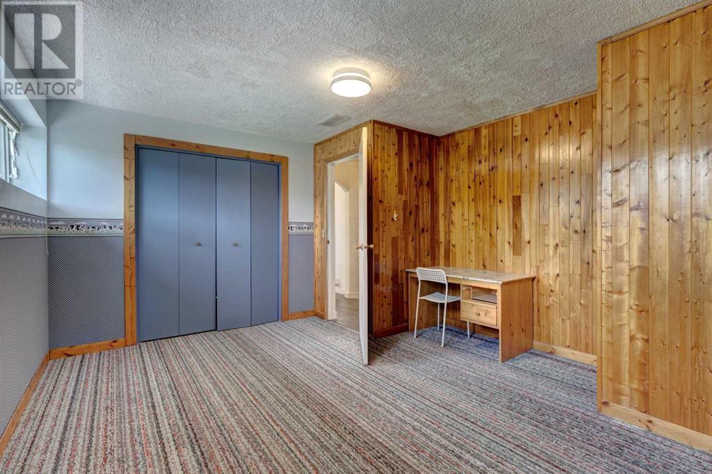 Single Family House Bi-level for Sale in  Braeside Drive SW Braeside Calgary 