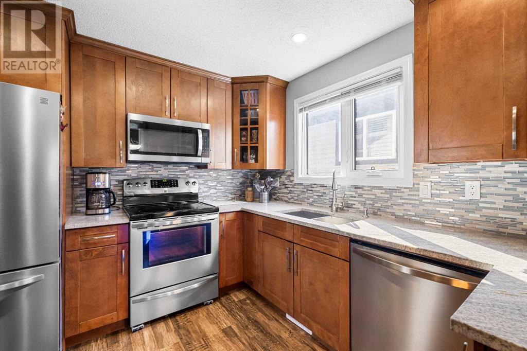 Single Family House Bungalow for Sale in  Macewan Glen Drive NW MacEwan Glen Calgary 