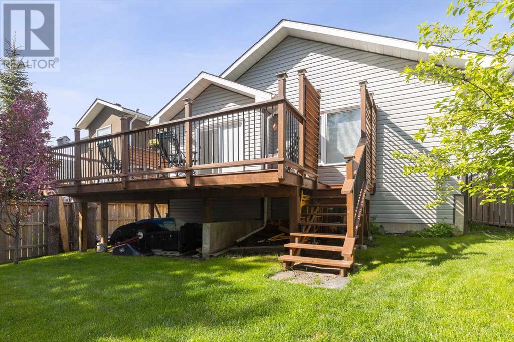 Single Family House Bungalow for Sale in  Arbour Wood Close NW Arbour Lake Calgary 