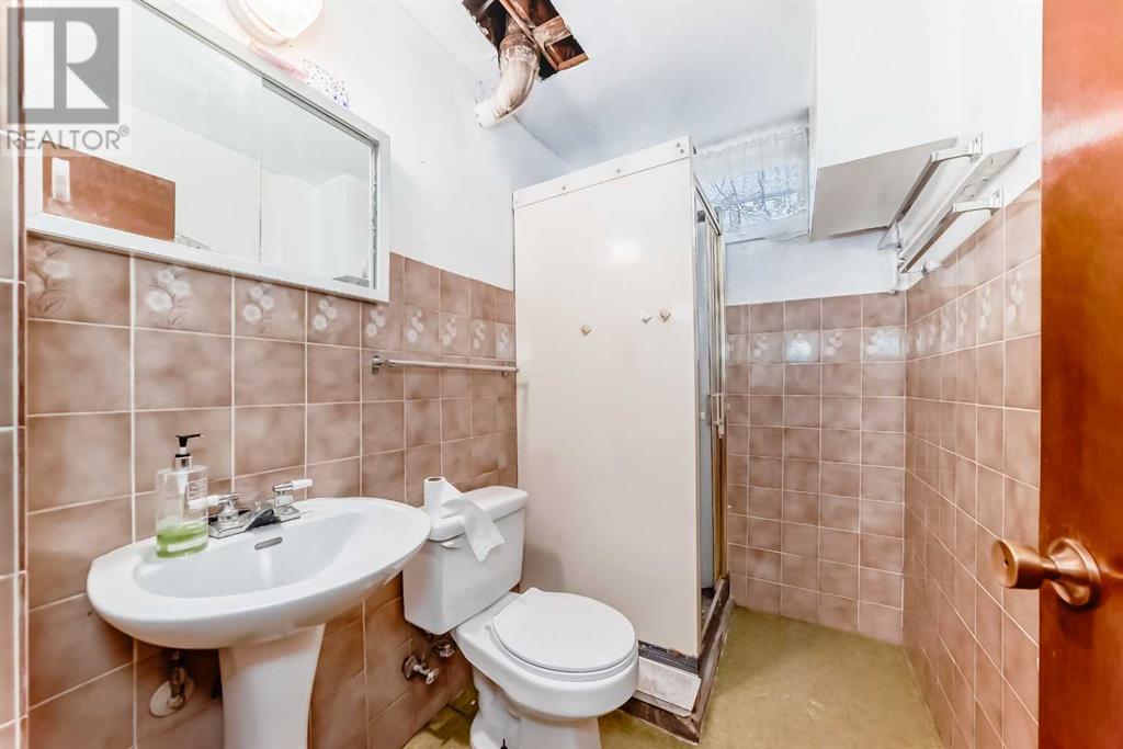 Single Family House Bungalow for Sale in  Rosewood Road NW Rosemont Calgary 