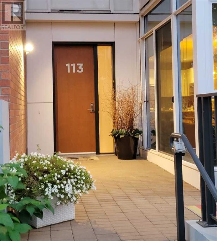 Single Family House for Sale in  Confluence Mews SE Downtown East Village Calgary 