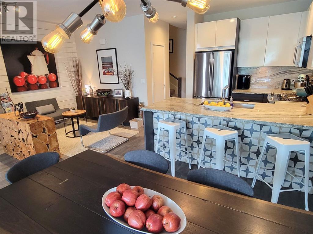 Single Family House for Sale in  Confluence Mews SE Downtown East Village Calgary 