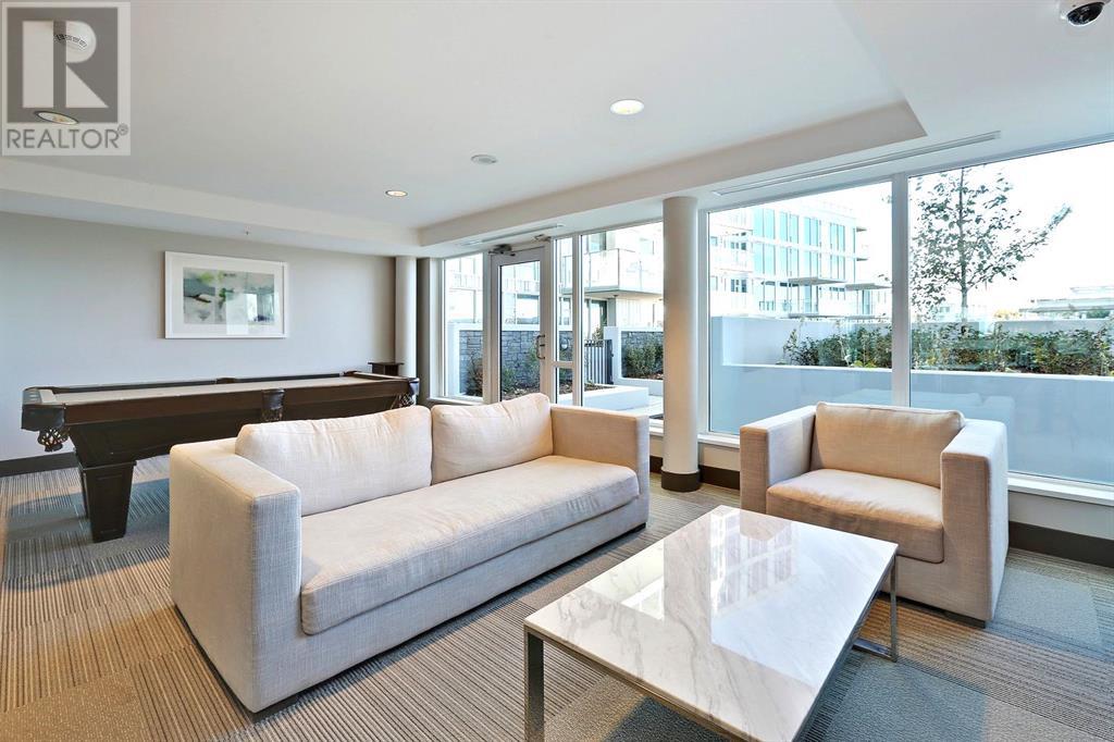 Single Family House for Sale in  Confluence Mews SE Downtown East Village Calgary 