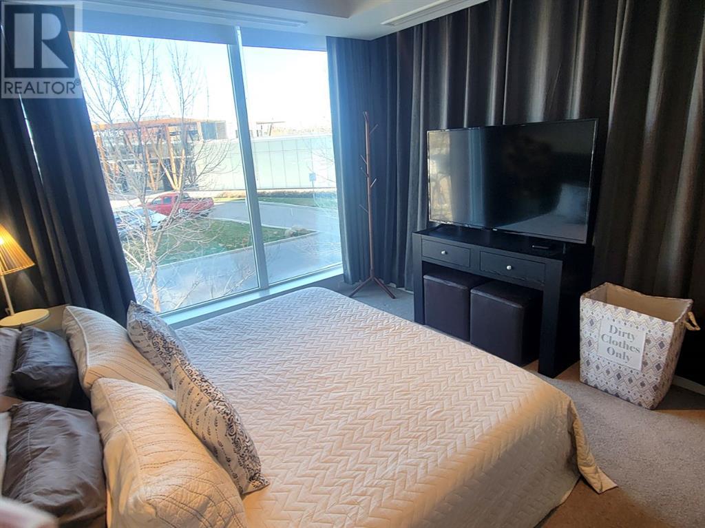 Single Family House for Sale in  Confluence Mews SE Downtown East Village Calgary 
