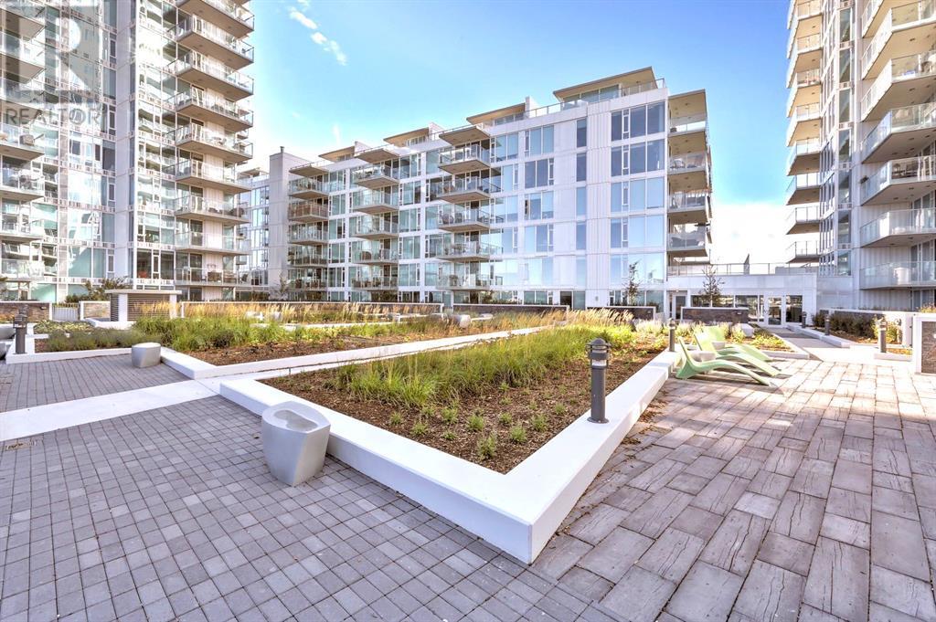 Single Family House for Sale in  Confluence Mews SE Downtown East Village Calgary 
