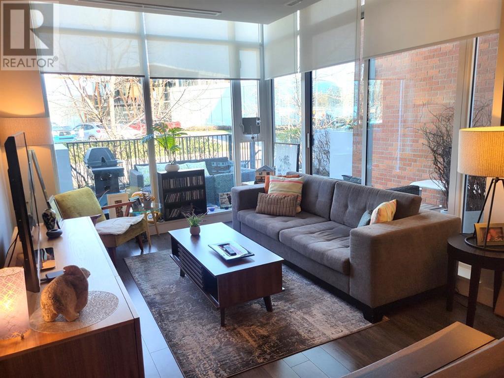 Single Family House for Sale in  Confluence Mews SE Downtown East Village Calgary 
