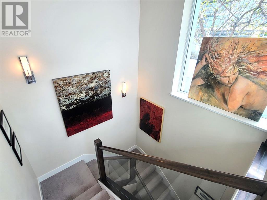 Single Family House for Sale in  Confluence Mews SE Downtown East Village Calgary 