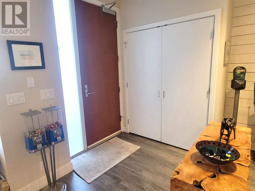 Single Family House for Sale in  Confluence Mews SE Downtown East Village Calgary 