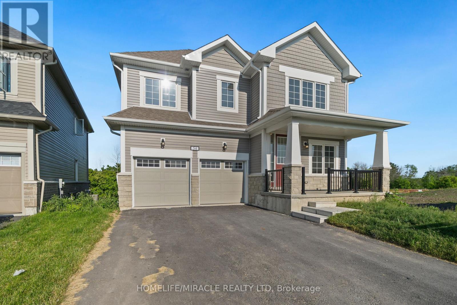Photo 2 of 54 Oakmont Drive, Loyalist ON