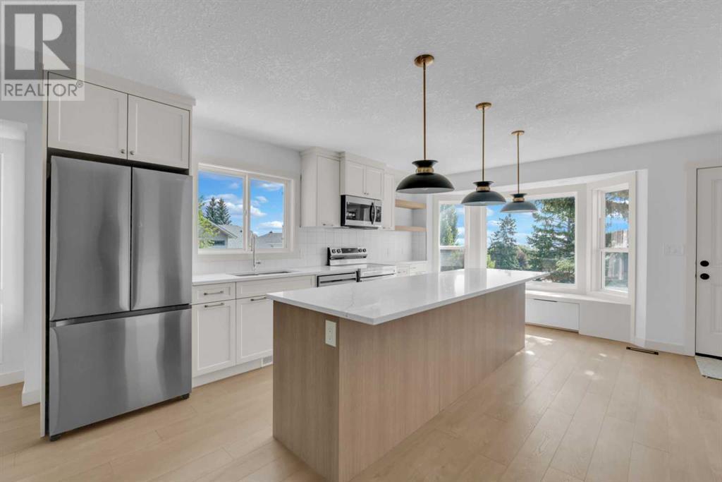 Single Family House 4 Level for Sale in  Macewan Meadow Way NW MacEwan Glen Calgary 