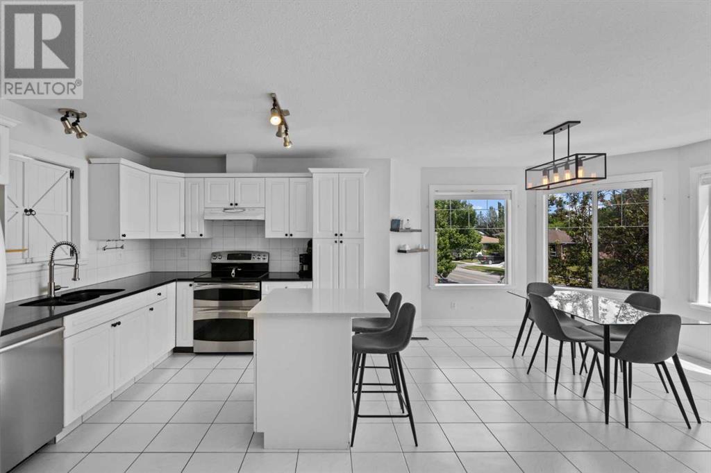 Single Family House 4 Level for Sale in  Northmount Drive NW Highwood Calgary 