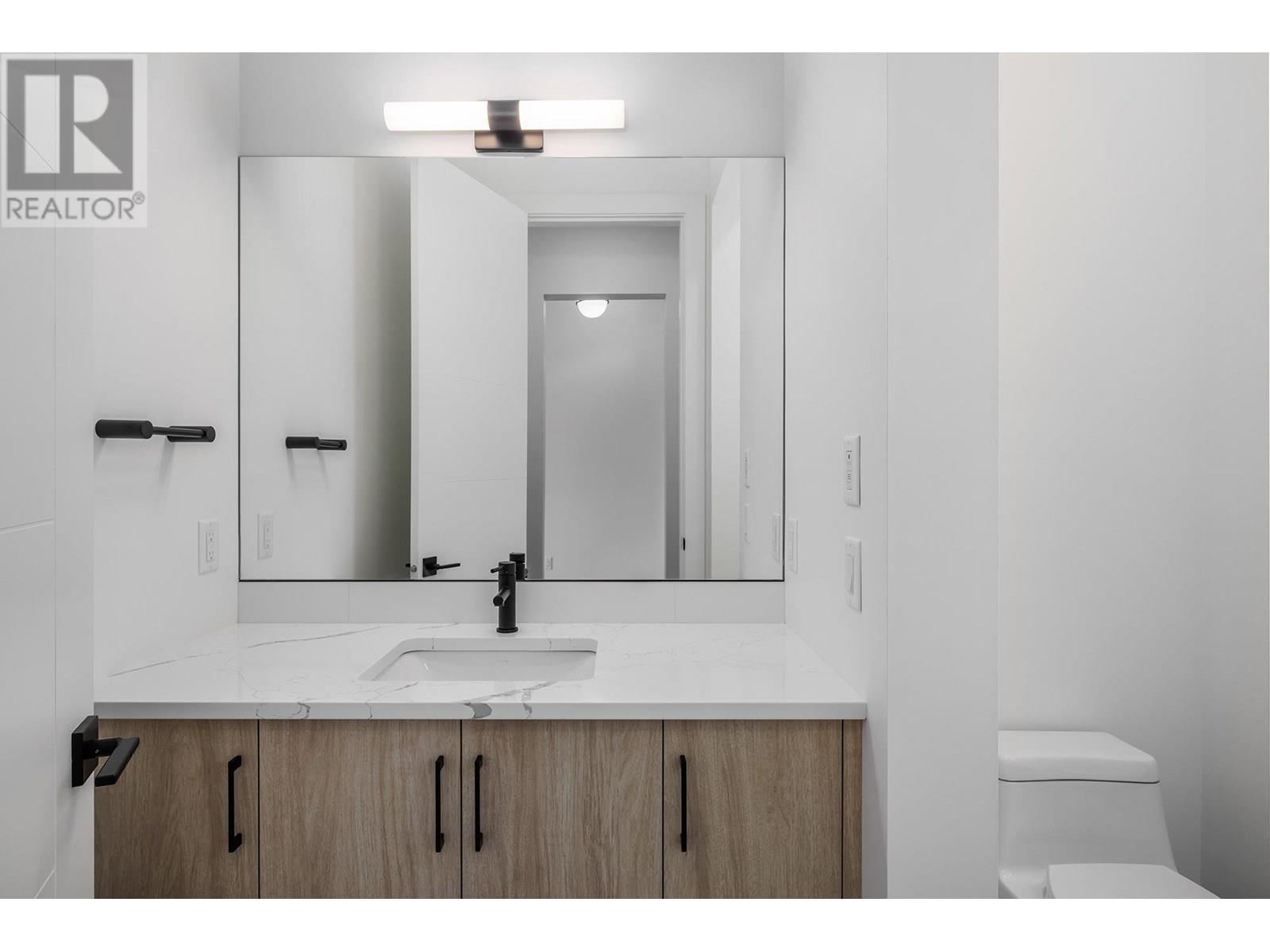 Photo 12 of 2048 Kentucky Crescent, Kelowna BC