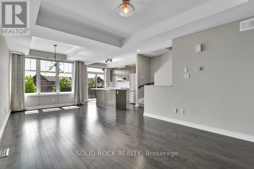 Open concept living, dining room and kitchen