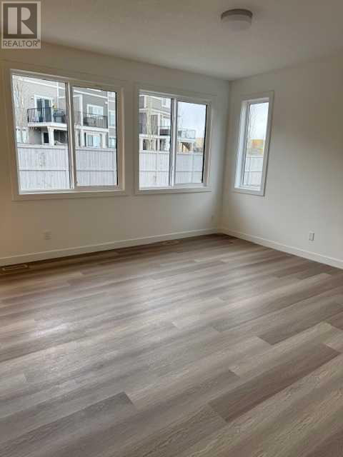 Photo 11 of 648 South Point Heath Sw, Airdrie AB